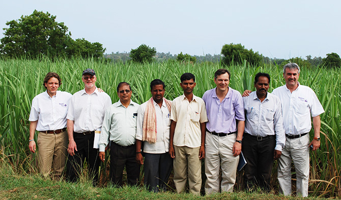 Ragus employees and cane farmers